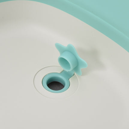 Ergonomic foldable baby bathtub, green plastic, 84.5 cm