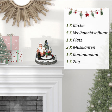 Kalėdų kaimelis. Kalėdinis miestelis su LED apšvietimu, 1 bažnyčia, 5 Kalėdų eglutėmis, 1 aikšte, 2 muzikantais, 1 vadu ir 1 judančiu traukinuku. Žiemos peizažas Kalėdoms.