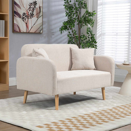 Kreminė dvivietė sofa su pagalvėlėmis, modernus dizainas, medinės kojelės