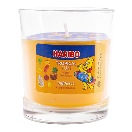 Vaisių kvapo žvakė stikliniame indelyje - saldus aromatas