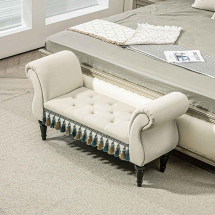 Beige velvet upholstered bench with storage and armrests